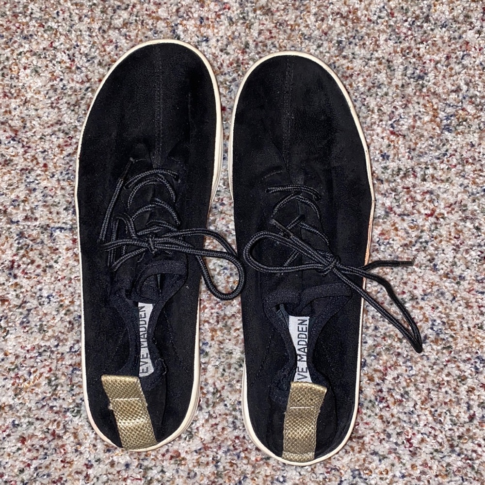 Black Steve Madden sneakers with gold back strap
